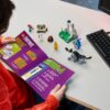 LEGO® Fortnite® 77075 - Tabara lui Peely si Sparkplug